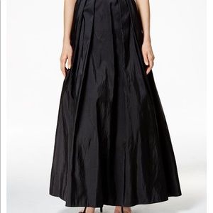 Alex Evenings Black Ball Gown with Pockets.